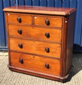 A Victorian mahogany chest, the top with moulded edge over two short and three long graduated