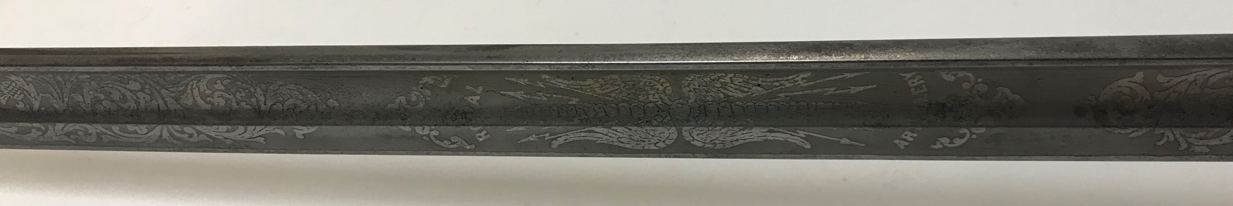 An Elizabeth II Royal Artillery dress sword by Wilkinson Sword Ltd with engraved blade, open work - Image 4 of 17