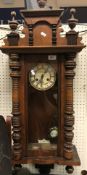 A circa 1900 walnut and stained beech cased Vienna regulator, the eight day movement with