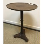 A 19th Century rosewood occasional table in the manner of Gillows, the replacement circular mahogany