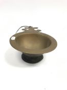 A 19th Century Chinese bronze censer / bowl with single shaped lug handle, raised on a circular