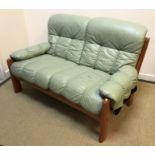 A mid 20th Century Norwegian Erkones teak framed pale green leather upholstered two seat sofa 137 cm