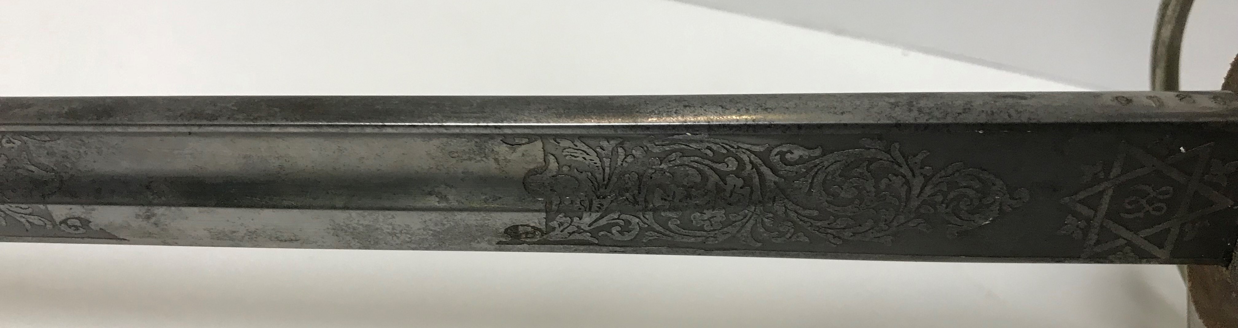 An Elizabeth II Royal Artillery dress sword by Wilkinson Sword Ltd with engraved blade, open work - Image 3 of 17