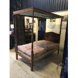 A 1960s Heal & Son mahogany framed single four poster bedstead in the 19th Century manner 118 cm