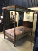 A 1960s Heal & Son mahogany framed single four poster bedstead in the 19th Century manner 118 cm