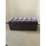 An Oliver Bonas grey buttoned upholstered box otto