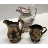 A collection of various china wares to include a puce transfer decorated toilet jug, small pearlware