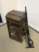 A vintage oak cased "The Daisy" vacuum cleaner and a bakelite cased "Vorwerk Kobold" vacuum cleaner