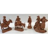 A group of four 20th Century Italian terracotta figures including "Fisherman mending net with fish
