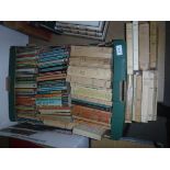 A box containing various vintage Livre de Poche books together with four paperback Lawrence