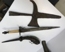 A collection of various daggers including an ivory handled hunting dagger with bronze knuckle
