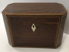 A 19th Century mahogany and inlaid tea caddy with
