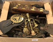 A box of various equine items including horse brasses, swingers, bits, martingales etc