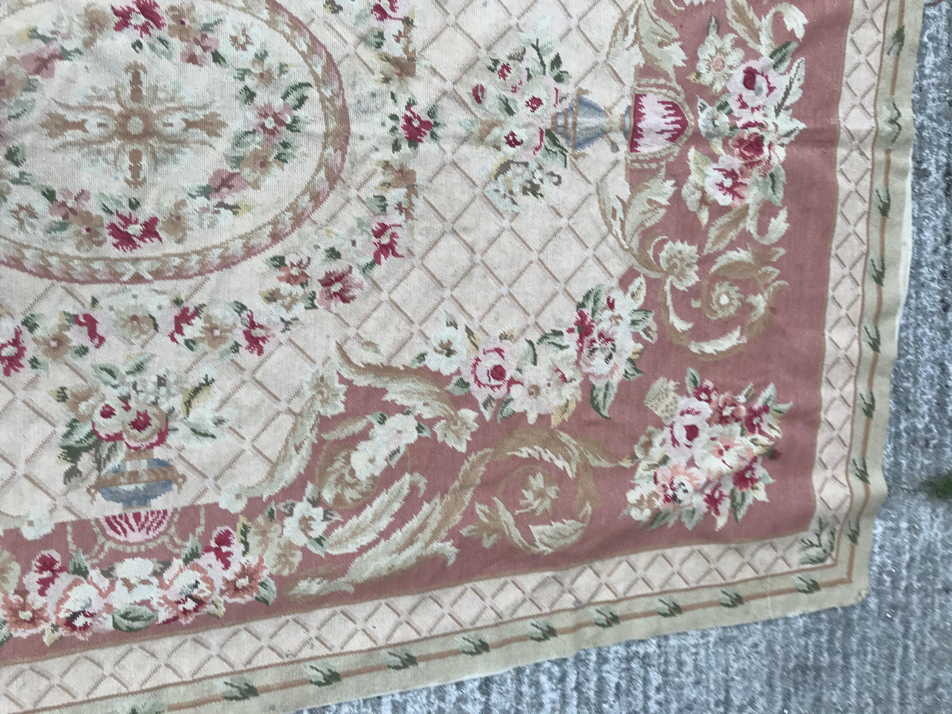 An Aubusson style rug, the central panel set with a floral decorated medallion on pale pink and dark - Image 4 of 12