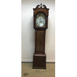 A 19th Century oak cased long case clock, the eight day movement with painted arch dial, the chapter