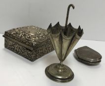 A collection of assorted silver and white metal wares to include an early 20th Century trophy top in