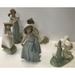 A collection of two Lladro figures "Girl with kittens" 21 cm high and "Girl in Summer dress"