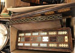 Three various cribbage boards, a collection of brass dominoes, carved box containing stained bone