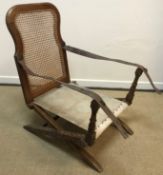 A Victorian mahogany framed folding campaign chair