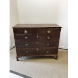 A 19th Century mahogany chest, the cross banded and barber pole strung top over two short and