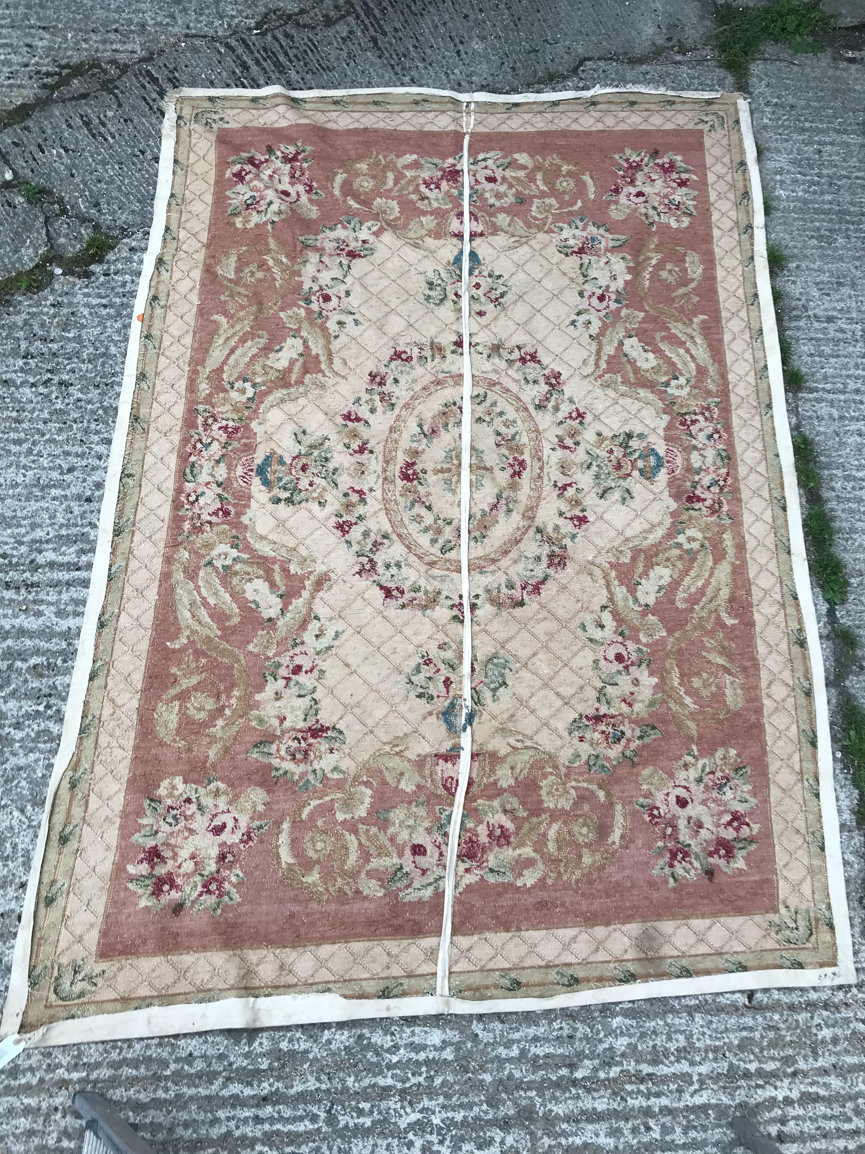 An Aubusson style rug, the central panel set with a floral decorated medallion on pale pink and dark - Image 12 of 12