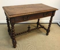 A 19th Century oak side table in the 17th Century Flemish manner, the top with moulded edge over a