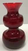 A large Scandinavian ruby glass vase 32 cm high together with a Swedish art glass vase of ruby,
