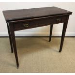 A 19th Century mahogany tea table, the rectangular top with moulded edge above a single frieze