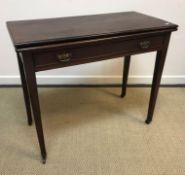 A 19th Century mahogany tea table, the rectangular top with moulded edge above a single frieze