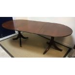 A 19th Century mahogany satinwood strung and cross banded fold over card table raised on square