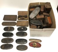 A collection of nine black painted tin sets of poc