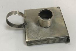 An Edwardian silver vesta case chamber stick of square form approx. 2.5cm in height and weighs