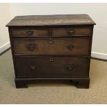 A 19th Century oak chest of two short over three long graduated drawers 87.7cm wide x 40cm deep x