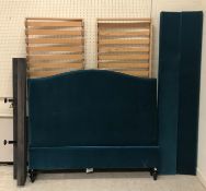 An "And so to Bed" teal velvet button upholstered