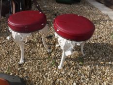A pair of cast iron garden seats with leatherette tops 44 cm high and 35cm diameter
