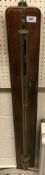 A 19th Century brass cased marine stick barometer by J B Dancer of Manchester inscribed "J B Dancer,