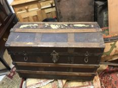 A late Victorian strap work and canvas covered metal bound dome top captain's trunk 77 cm wide x