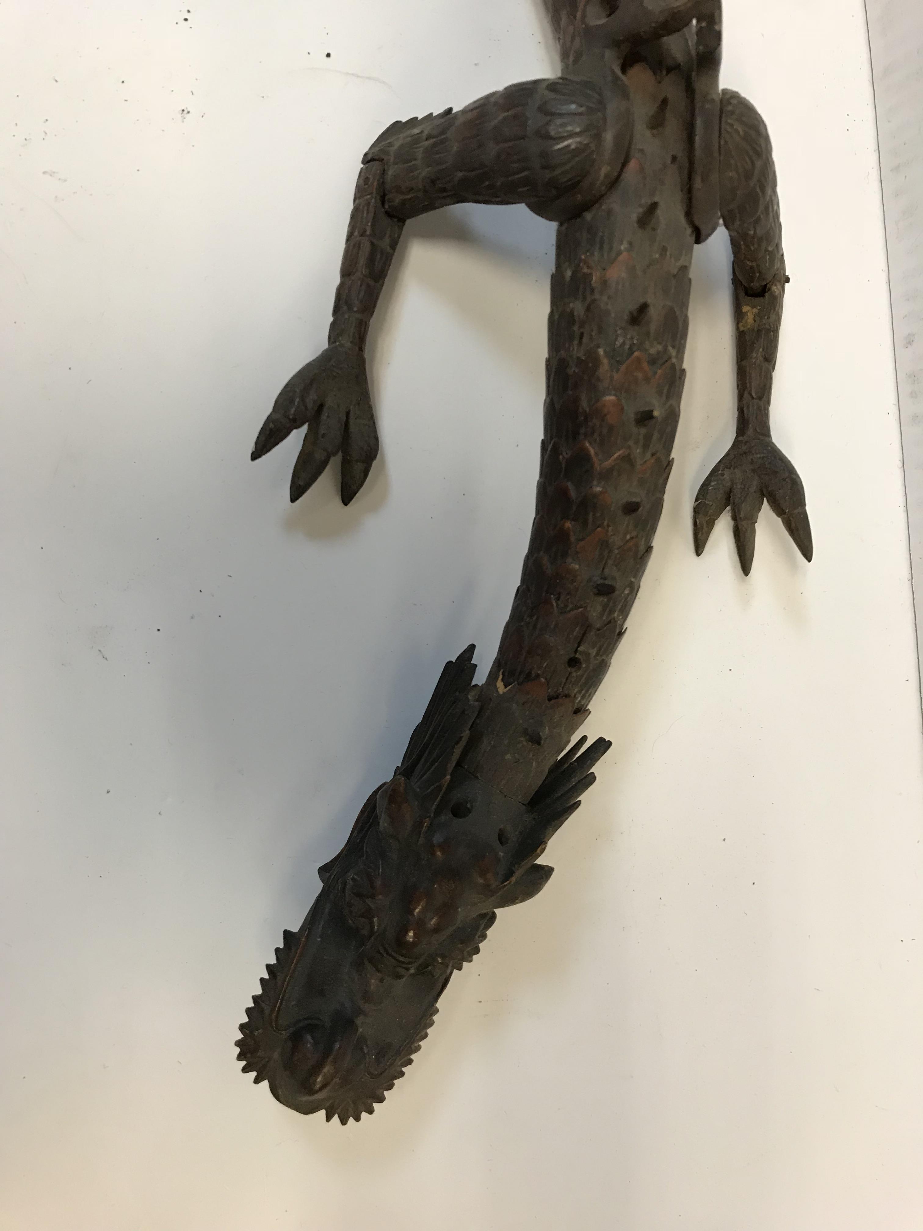 A 19th Century Japanese carved treenware segmented dragon figure (rear right leg, lower jaw, - Image 20 of 25