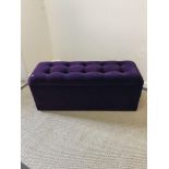 An Oliver Bonas purple buttoned upholstered box ottoman 120 cm wide x 41 cm deep x 49 cm high