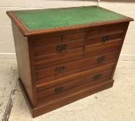 A late Victorian mahogany chest of two short over two long drawers, the top now with leather