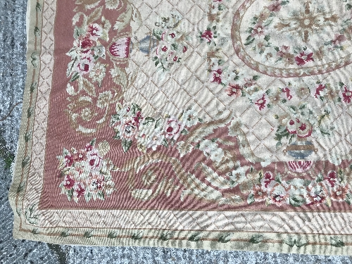 An Aubusson style rug, the central panel set with a floral decorated medallion on pale pink and dark - Image 5 of 12