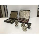 A collection of silver and plated wares comprising a Victorian silver cream jug with reeded