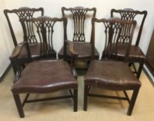 A set of five 19th Century mahogany Chippendale style dining chairs with moulded backs over shaped