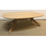 A Matthew Hilton oak "cross oval" coffee table for