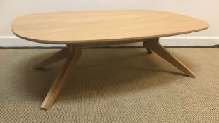 A Matthew Hilton oak "cross oval" coffee table for