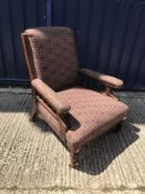 A Victorian mahogany framed upholstered armchair,