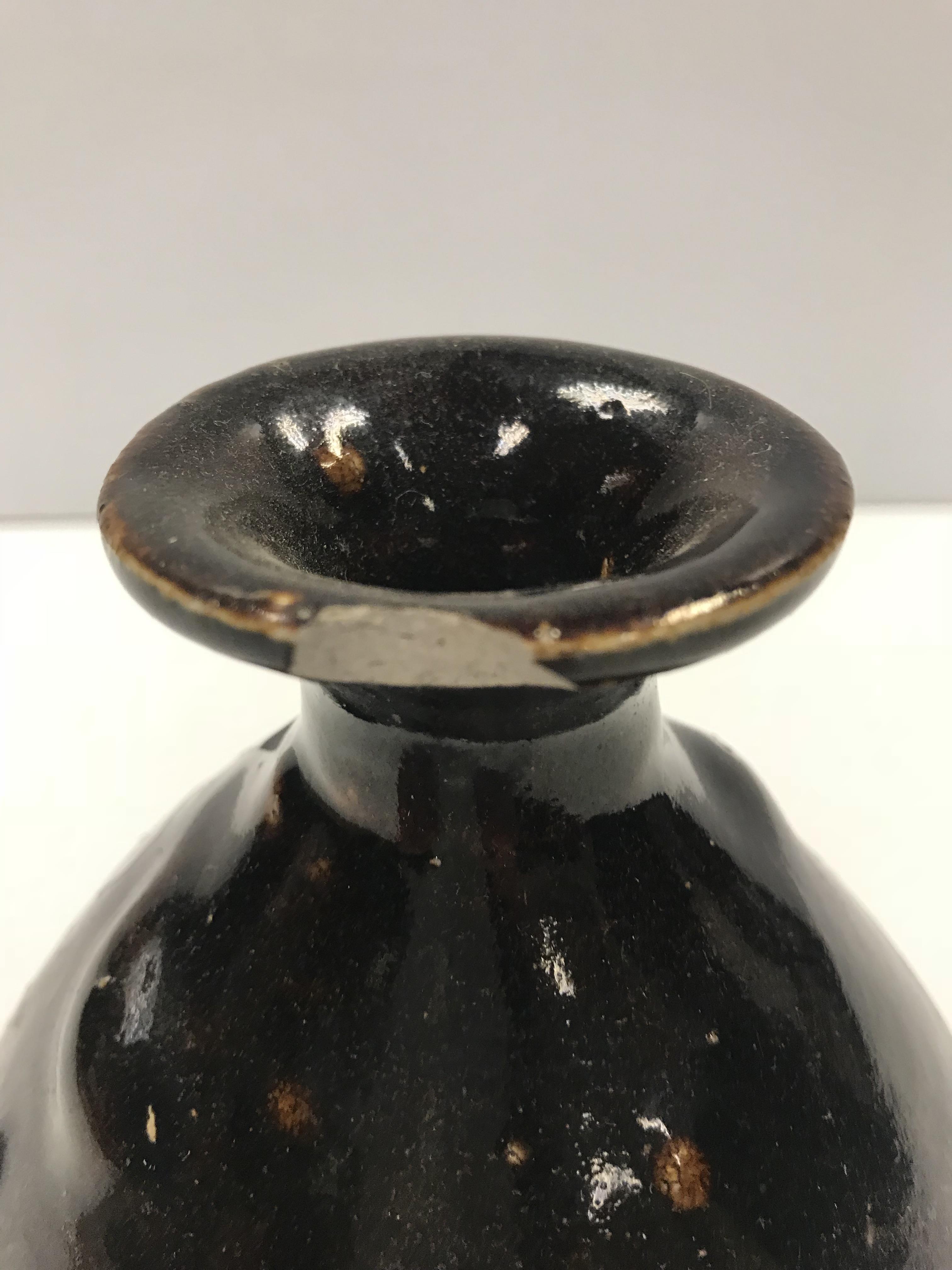 A Chinese treacle glazed vase of bellied form, bea - Image 2 of 2