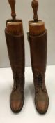 A pair of early 20th Century gents brown leather part laced hunting boots together with trees and