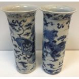 A pair of 19th Century blue and white Chinese cyli