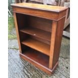 A mahogany bookcase in the Victorian manner with two adjustable shelves, on a plinth base, 74 cm